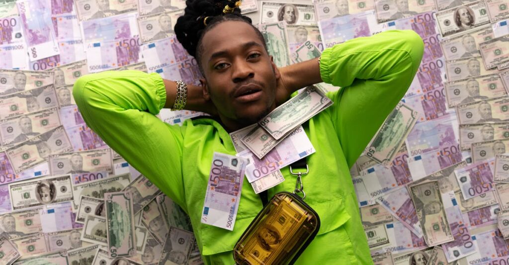 African American man in green outfit lying on a bed of dollar and euro banknotes, symbolizing wealth.